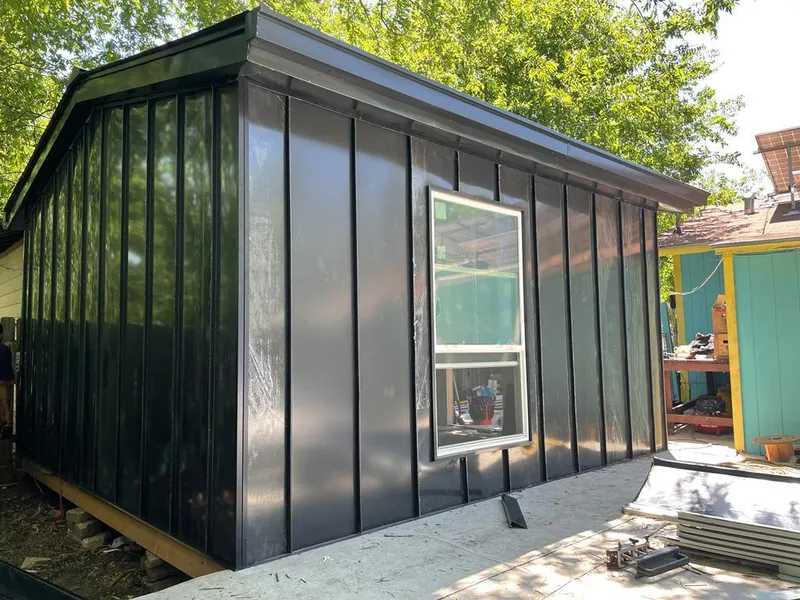 Black standing seam metal wall panels for Roof Inspection in Punxsutawney