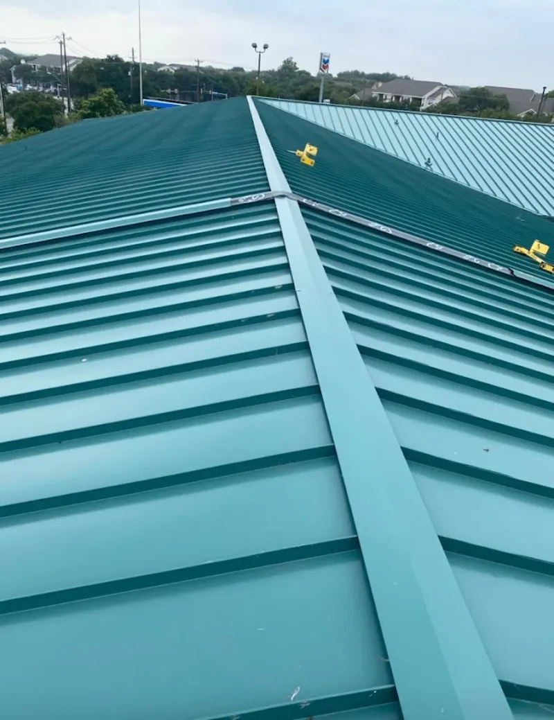 Green commercial metal roof ridge and valley for Metal Roof Repair in Punxsutawney